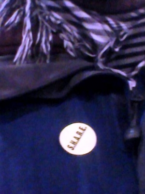 The SHARE sticker, found on every coat for Cork people, leading up to Christmas.